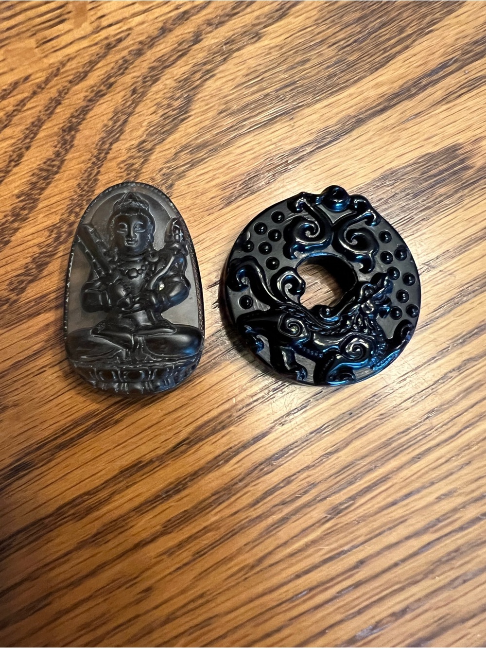 Lot of 2 stone carving pendants or palm stones.